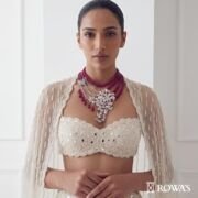 Garden of Eden Necklace in Rosecut Diamonds Gross wt – 61.08 gms Gold wt – 47.19 cts Diamond Wt – 9.9 cts Ruby mala – 686.8 cts Ruby – 59.55 cts Inspired by the lush and enchanting beauty of the mythical Garden of Eden, this necklace features cascading ruby beads that symbolize the abundance of nature. The intricate diamond floral motifs represent the garden’s exquisite blooms, creating a harmonious blend of natural beauty and luxury. This piece is perfect for those who appreciate the elegance and wonder of a paradisiacal garden.